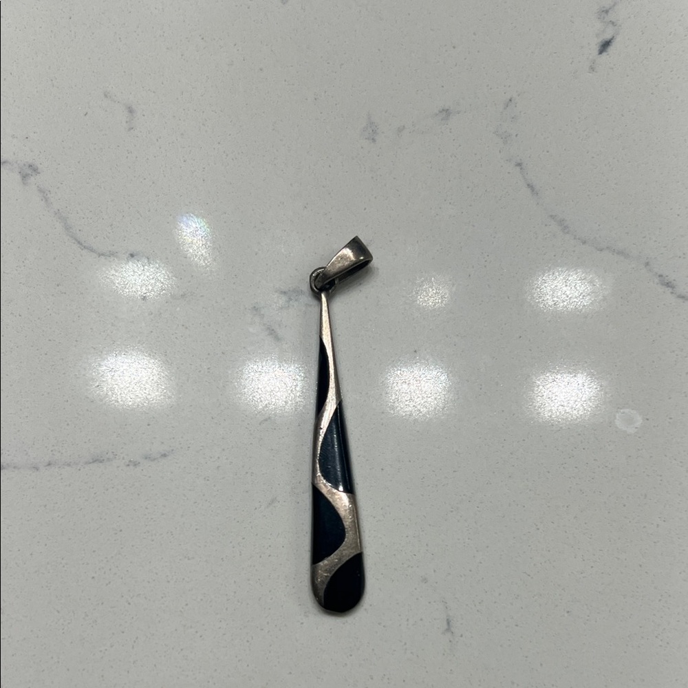 Stylish Silver and Black Teardrop Pendant